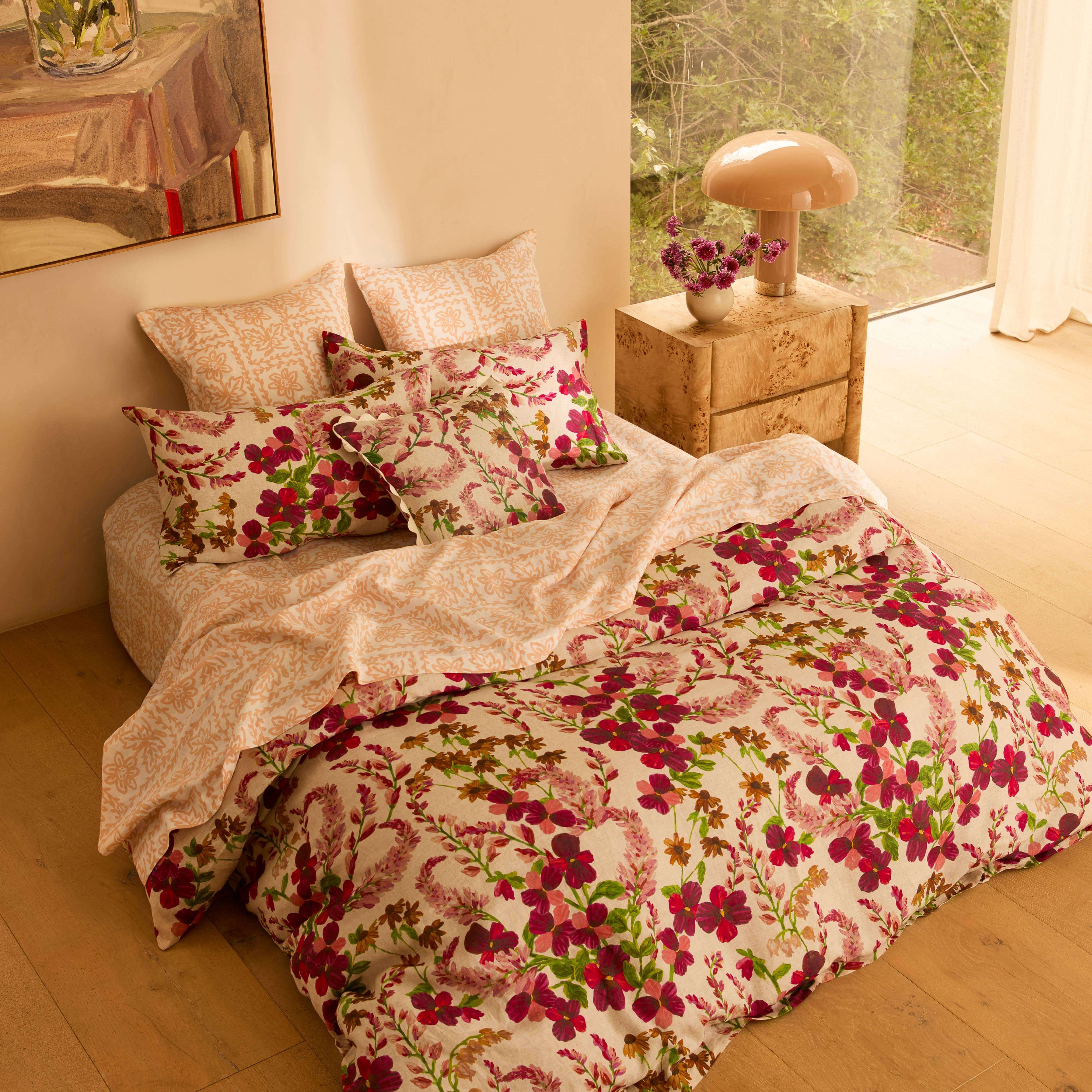 Beautiful floral bedding in a bed
