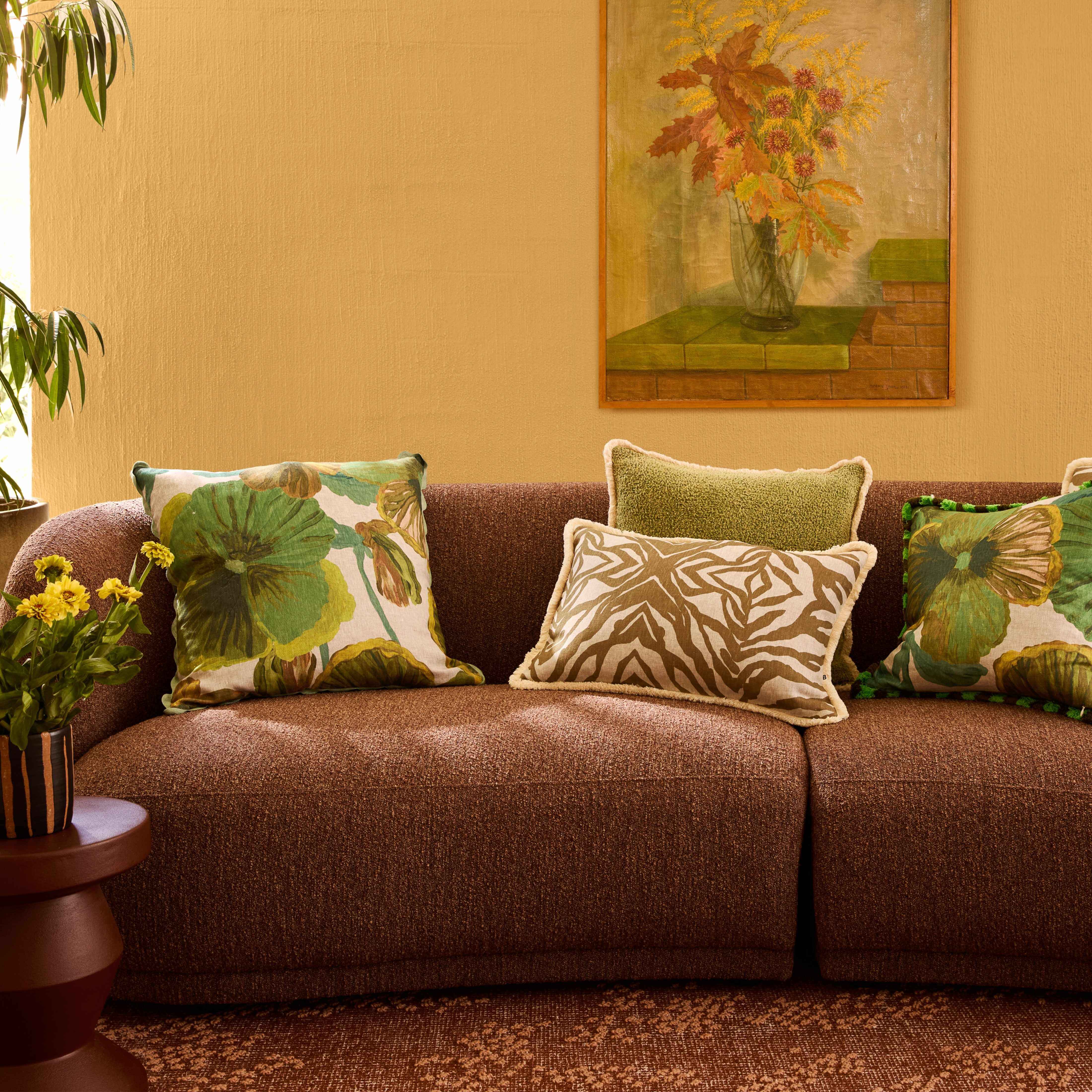 The art house cushions on the couch