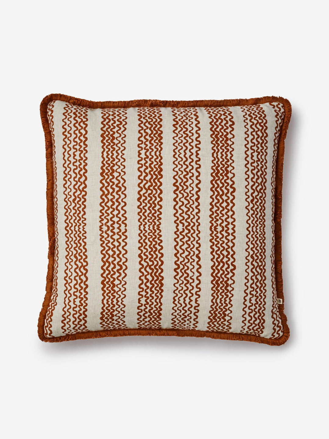 Decorative pillow with brown and white striped pattern on a light gray background