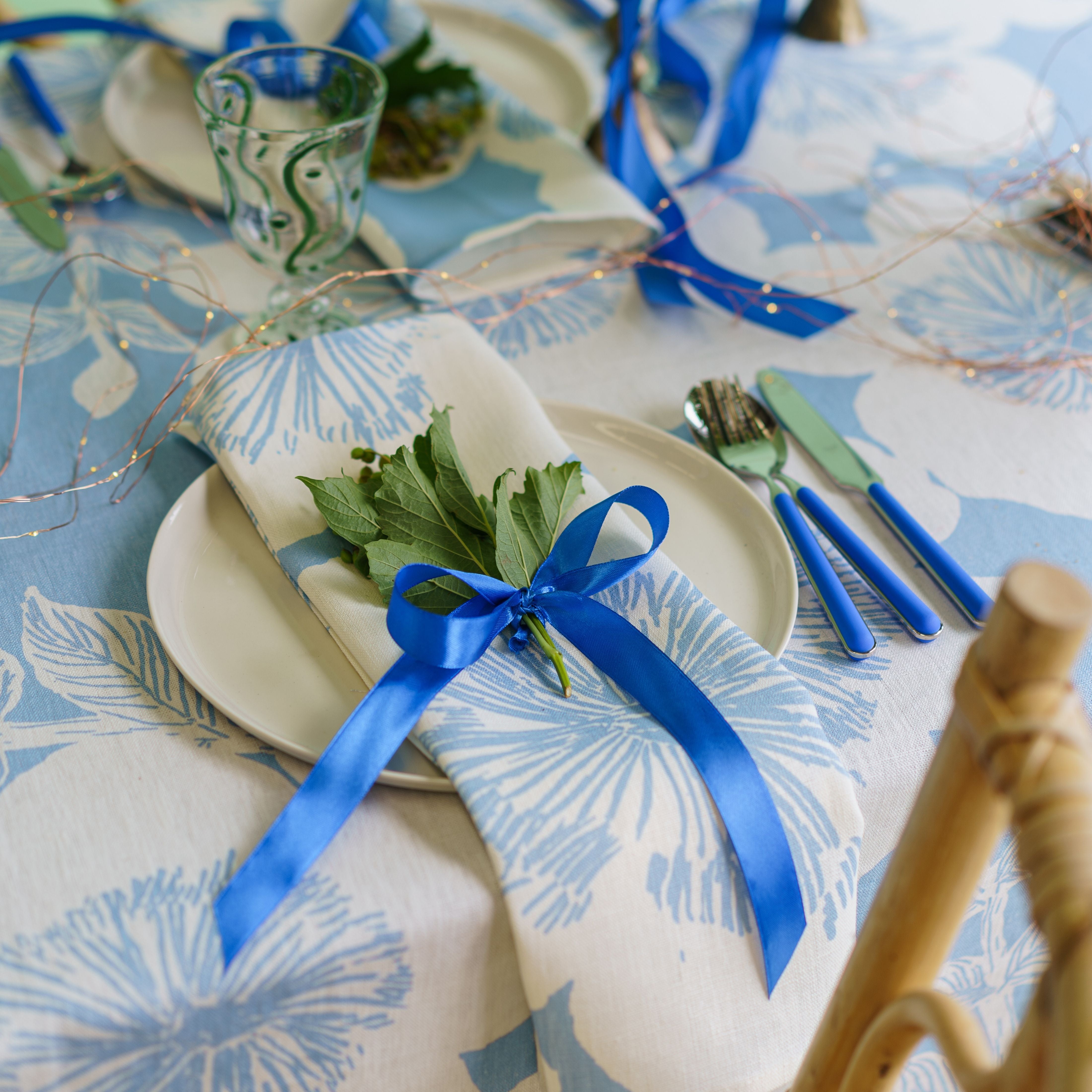 Bonnie sitting at a dining table 