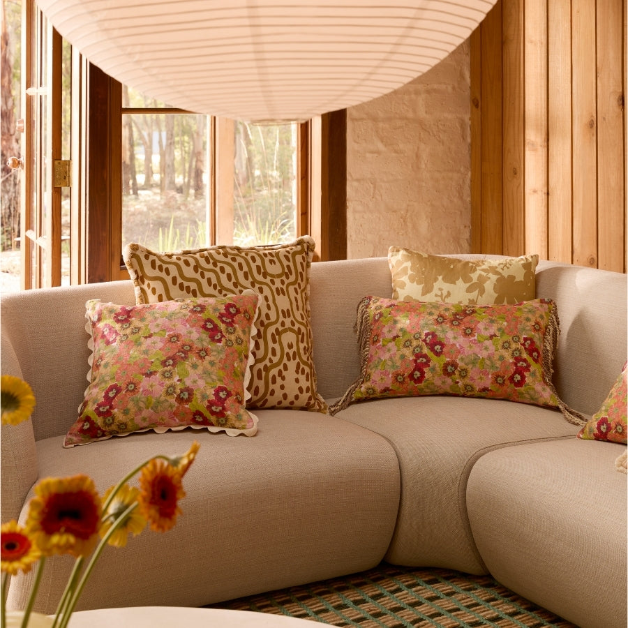 floral cushions on the couch 