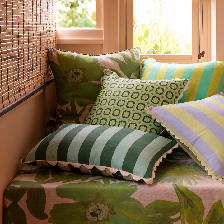 Bold Stripe Verde 60x40cm Cushion Styled On Banquette Seating With Complementary Cushions