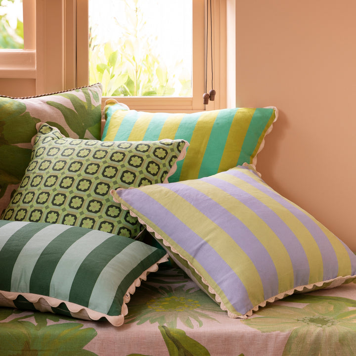 Bold Stripe Blue Lime 50cm Cushion Styled On Banquette Seating With Complementary Cushions