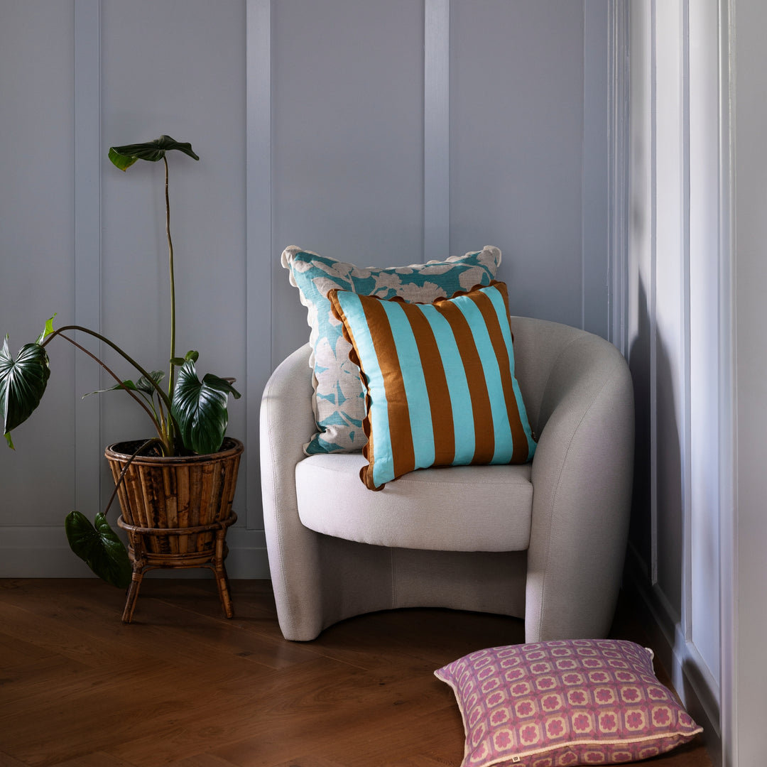 Bold Stripe Jade Tan 50cm Cushion Styled On Chair | Blue & Brown Striped Cushion