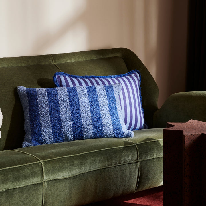 Thin Stripe Blue 60x40cm Cushion Styled On Green Sofa With Boucle Stripe Blue Cushion