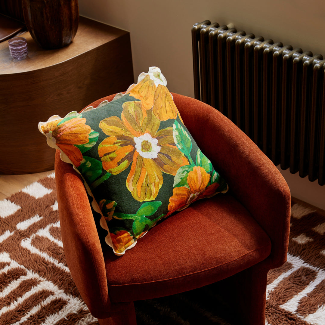 Rosetta Marigold 50cm Cushion Styled On Red Armchair