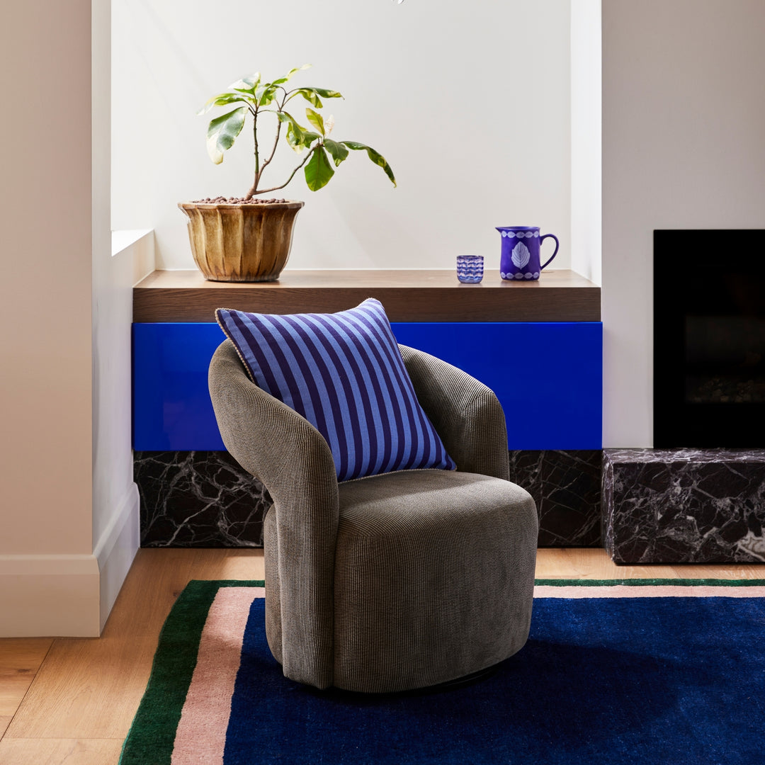 Thin Stripe Blue 60cm Cushion Styled On Grey Armchair