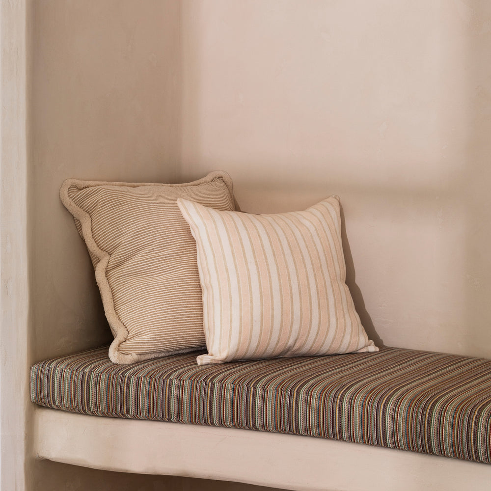 Linear Buff 50cm Linen Cushion Styled On Banquette Seating With Nile Tan Cushion