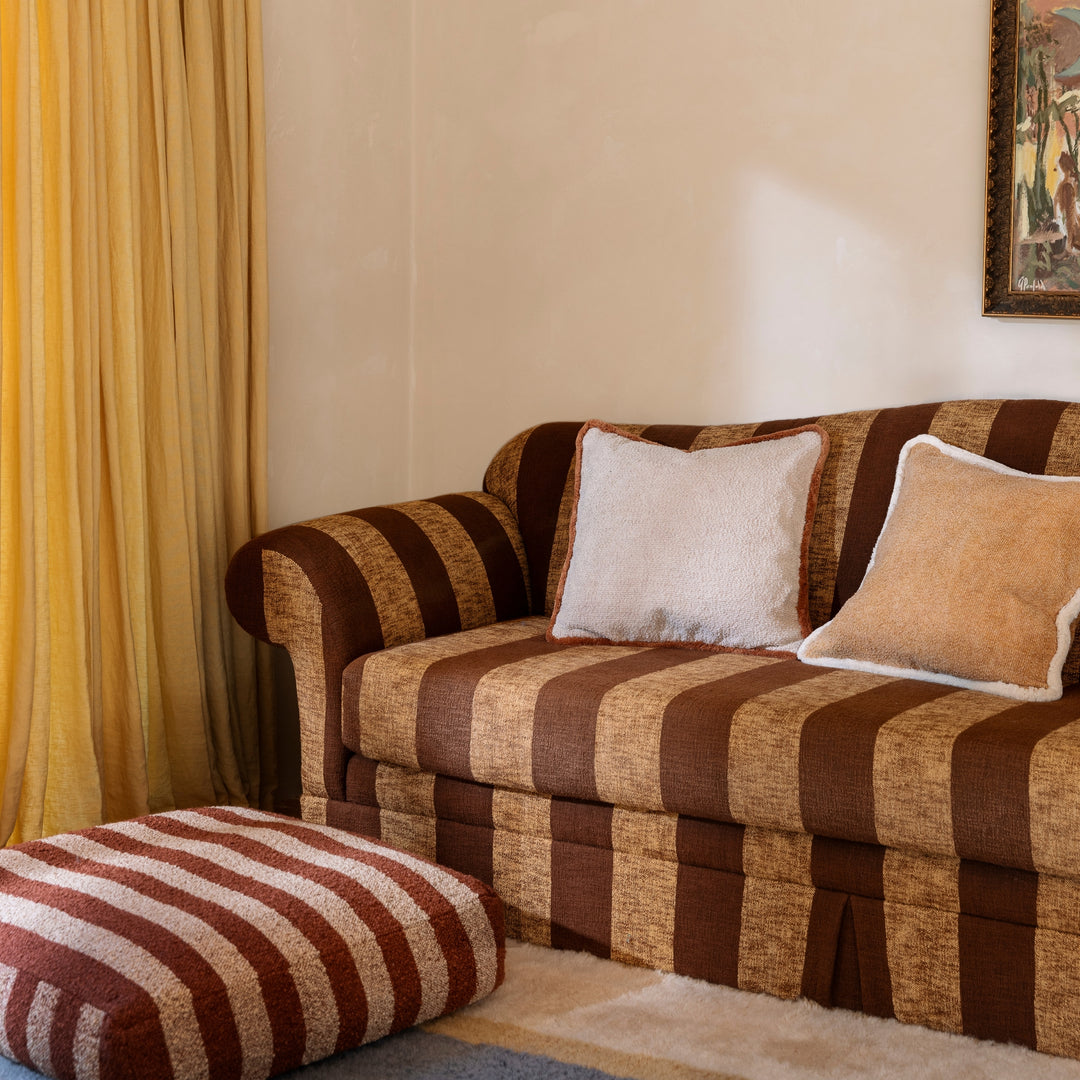 Grain Cream 50cm Cotton Cushion Styled On Striped Sofa With Grain Tan Cushion