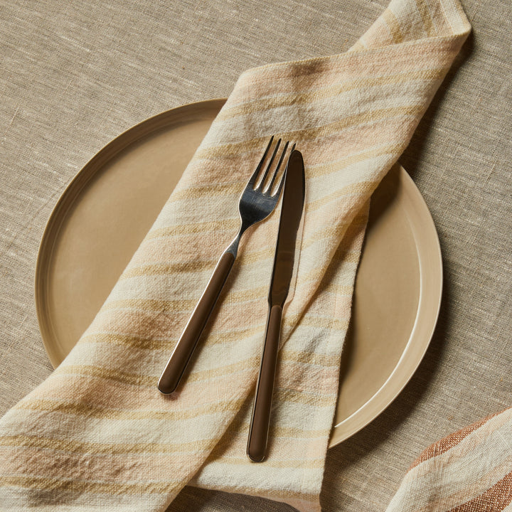 Linear Buff Napkins Styled With Neutral Table Linens