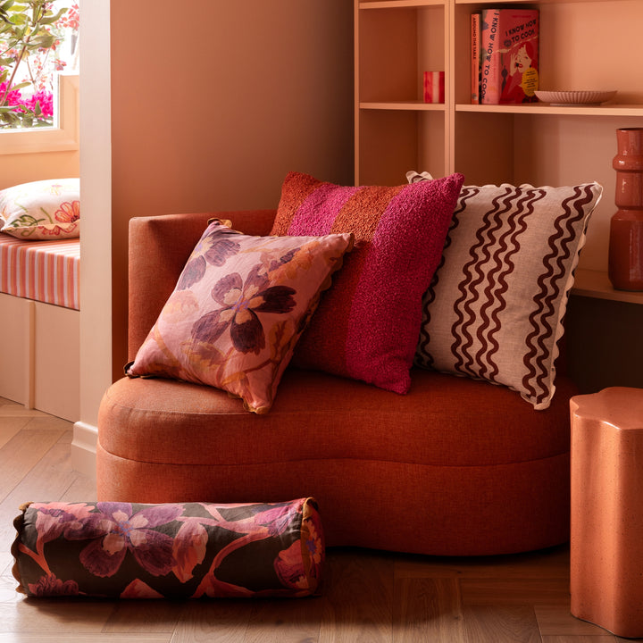 Wide Stripe Magenta 60cm Boucle Cushion Styled On Terracotta Sofa With Complementary Cushions