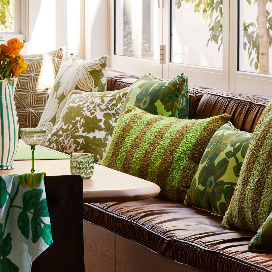 Rosetta Dark Mint 60cm Cushion Styled on Banquette Seating With Green Floral & Green Striped Cushions