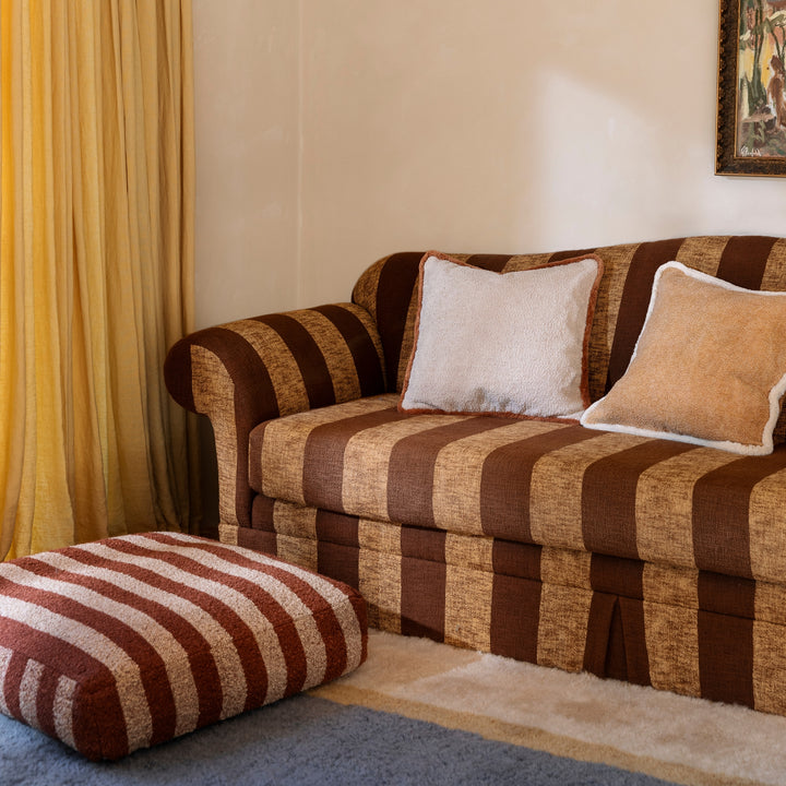 Boucle Stripe Chocolate Pouffe Styled With Striped Brown Sofa