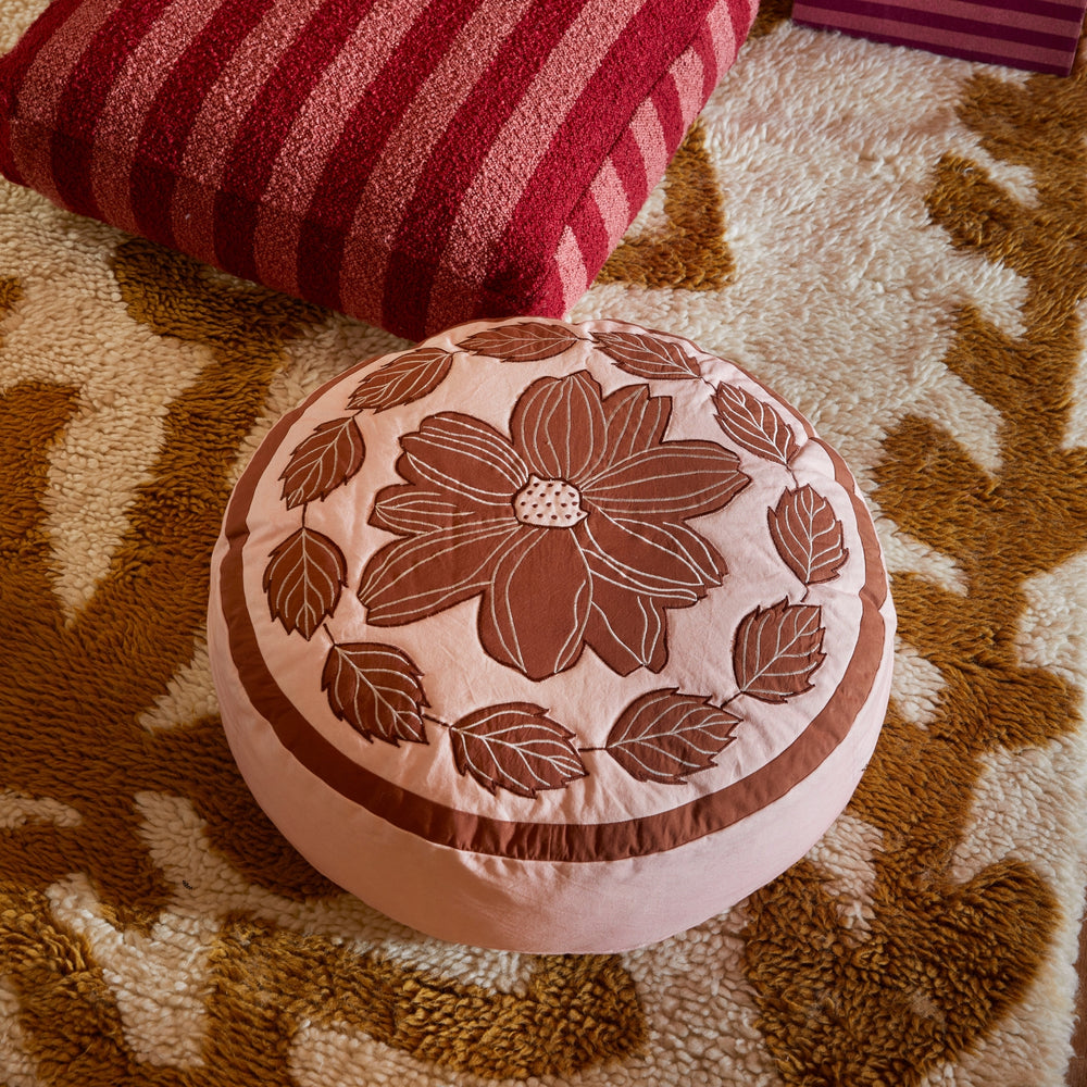 Margot Pink Round 65cm Pouffe Styled On Floor With Boucle Stripe Burgundy Pouffe & Daisy Mustard Wool Rug