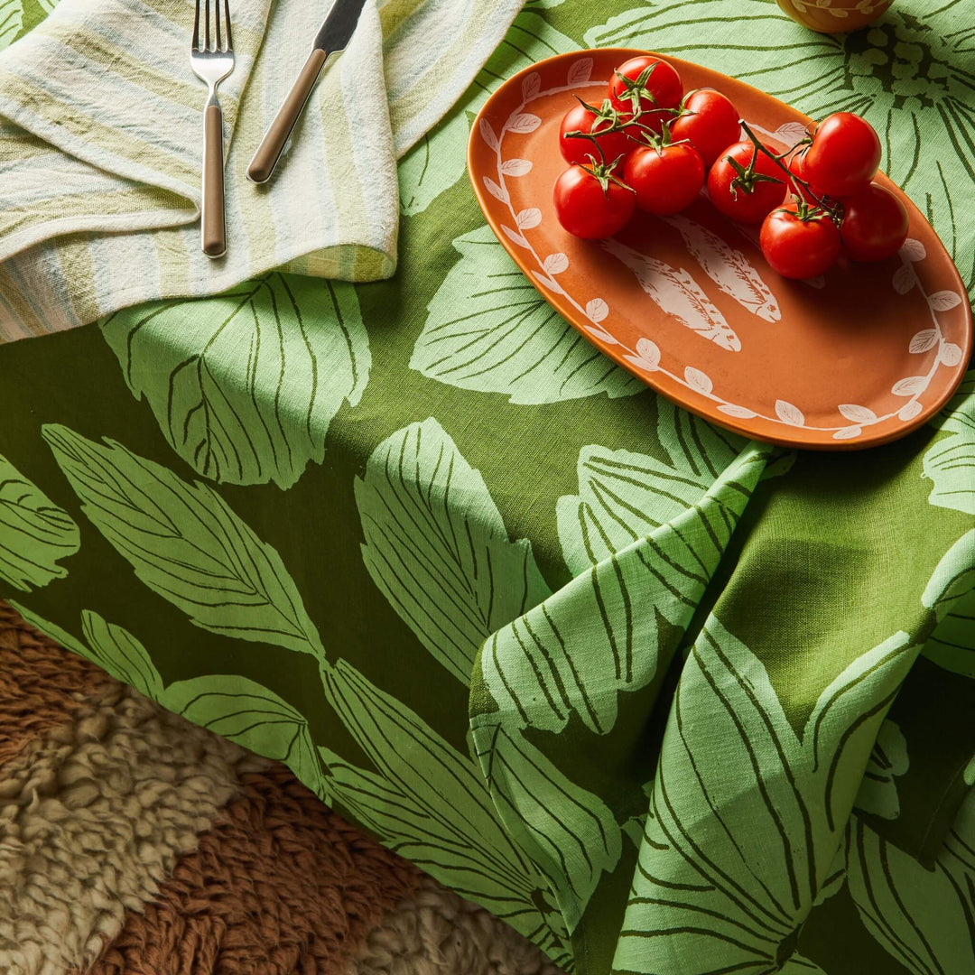 Margot Green Tablecloth Styled With Linear Green Stripe Napkins